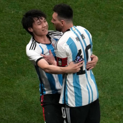 Young Fan Hugs Messi in the Middle of a Match